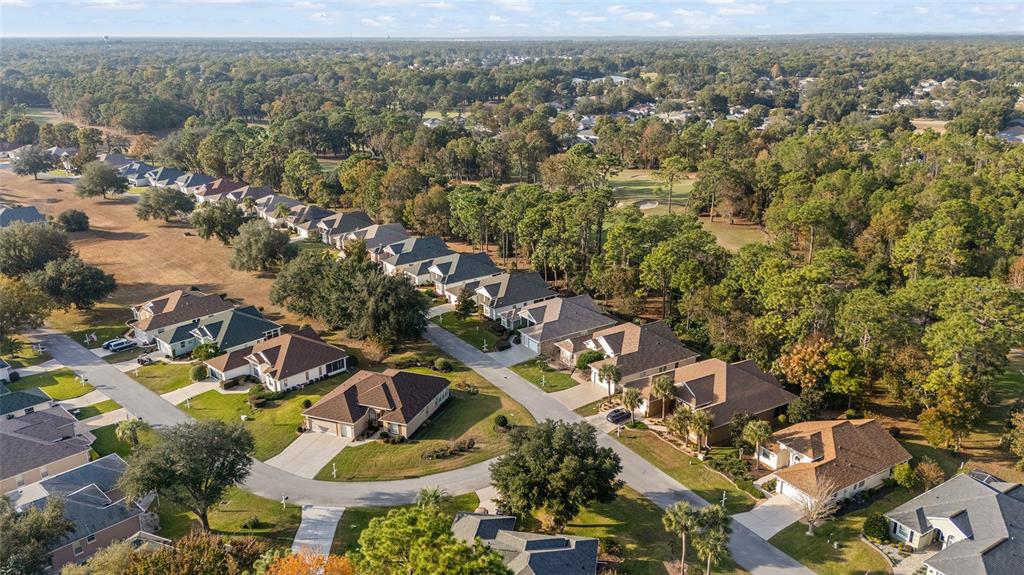 11621 Southwest 72nd Circle Ocala, FL 34476 - Photo 59 of 66 an aerial view of a city with lots of residential buildings