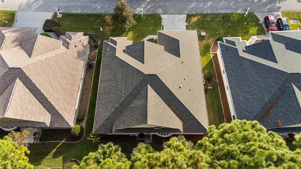 11621 Southwest 72nd Circle Ocala, FL 34476 - Photo 64 of 66 a front view of a house with garden