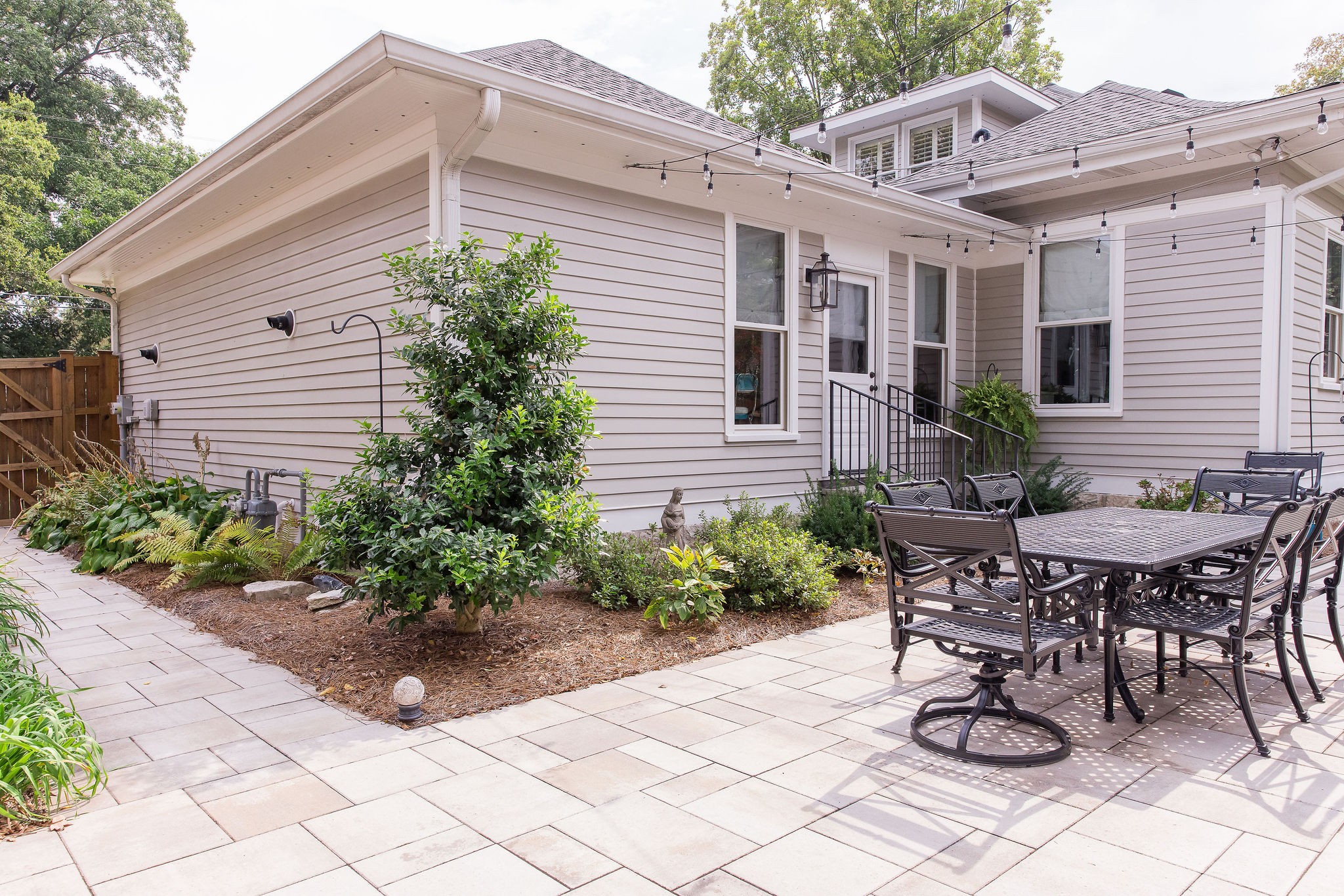 200 Battle Avenue Franklin, TN 37064 - Photo 66 of 95 a view of a patio with table and chairs and potted plants