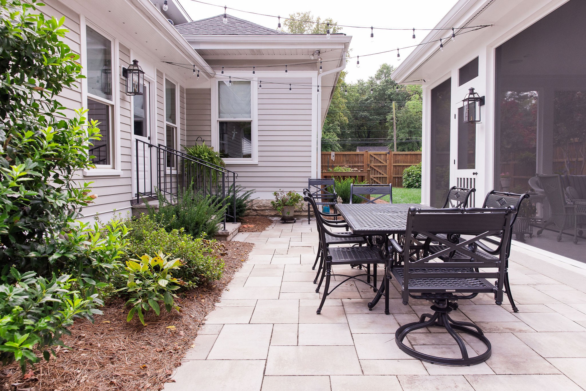 200 Battle Avenue Franklin, TN 37064 - Photo 68 of 95 a view of a patio with table and chairs and potted plants