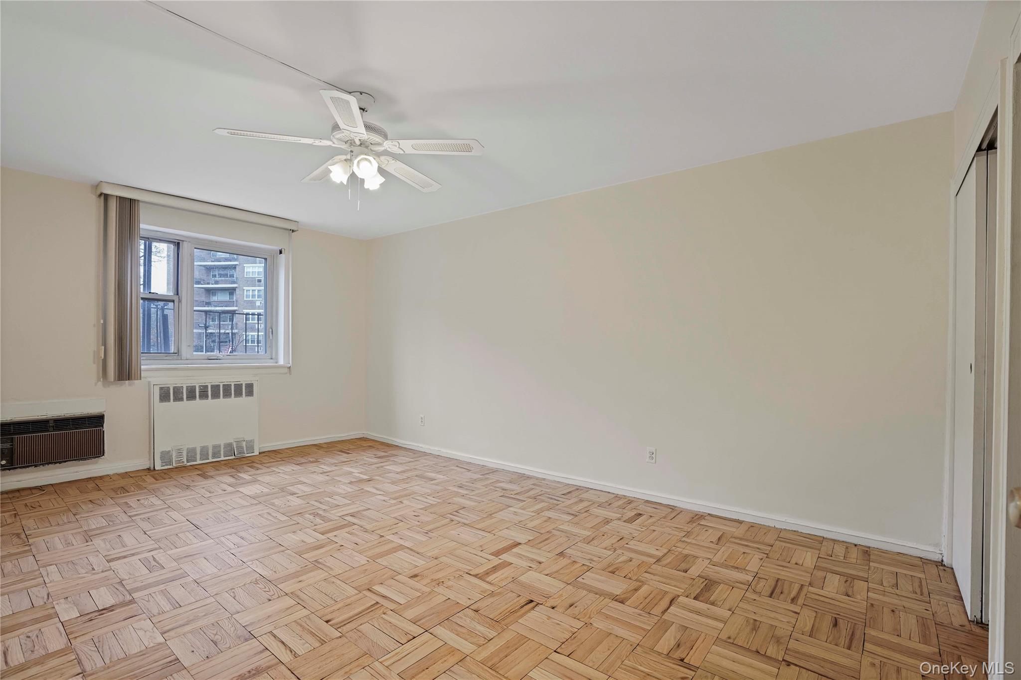 151-31 88th Street, Unit 1B Queens, NY 11414 - Photo 15 of 24 a view of an empty room with a window