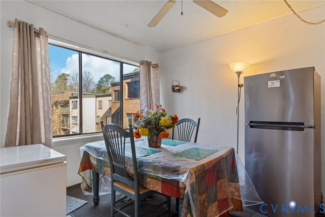 1503 Largo Road, Unit 201 Richmond, VA 23238 - Photo 21 of 37 a dining room with furniture and window