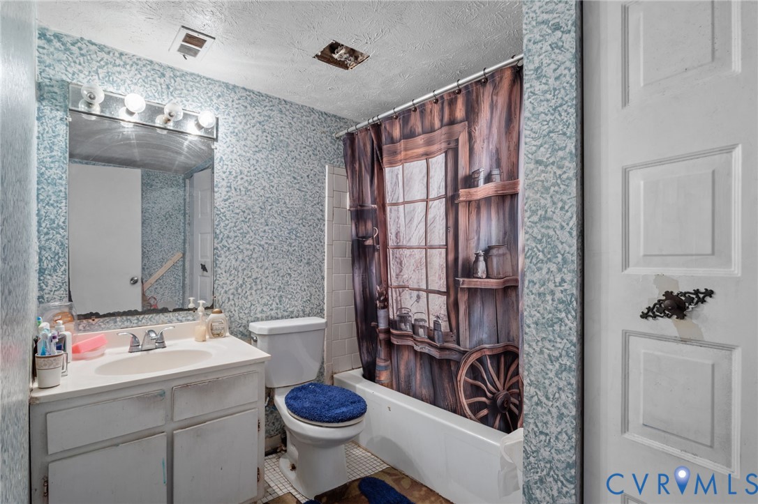 1503 Largo Road, Unit 201 Richmond, VA 23238 - Photo 9 of 37 a bathroom with a sink toilet and shower