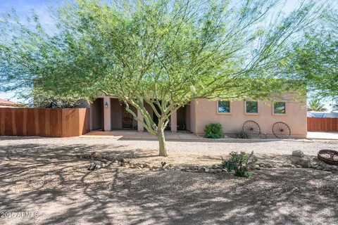 a house with trees in front of it