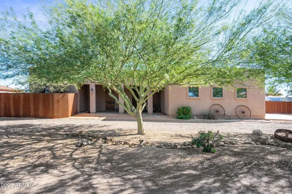 a house with trees in front of it