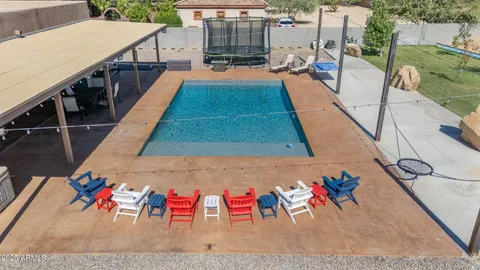 a view of a patio with couches table and chairs