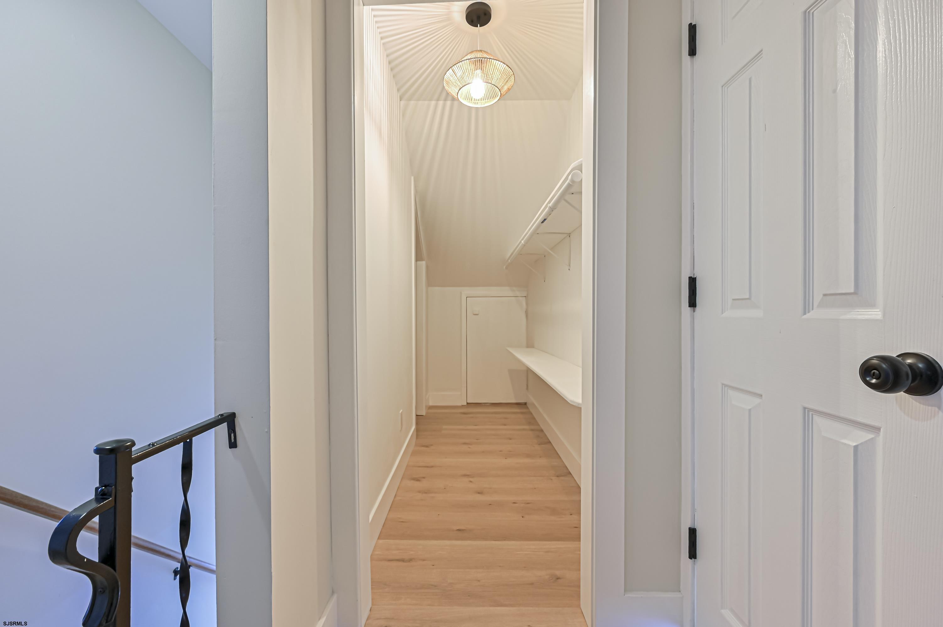 5906 Gaskill Street Mays Landing, NJ 08330 - Photo 30 of 39 a view of a hallway with wooden floor and front door
