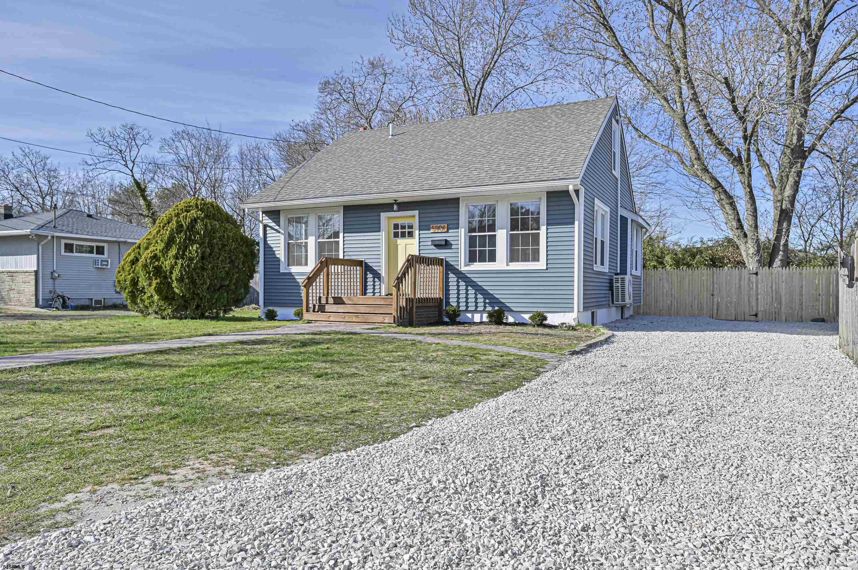 5906 Gaskill Street Mays Landing, NJ 08330 - Photo 3 of 39 a view of a house with backyard and a tree