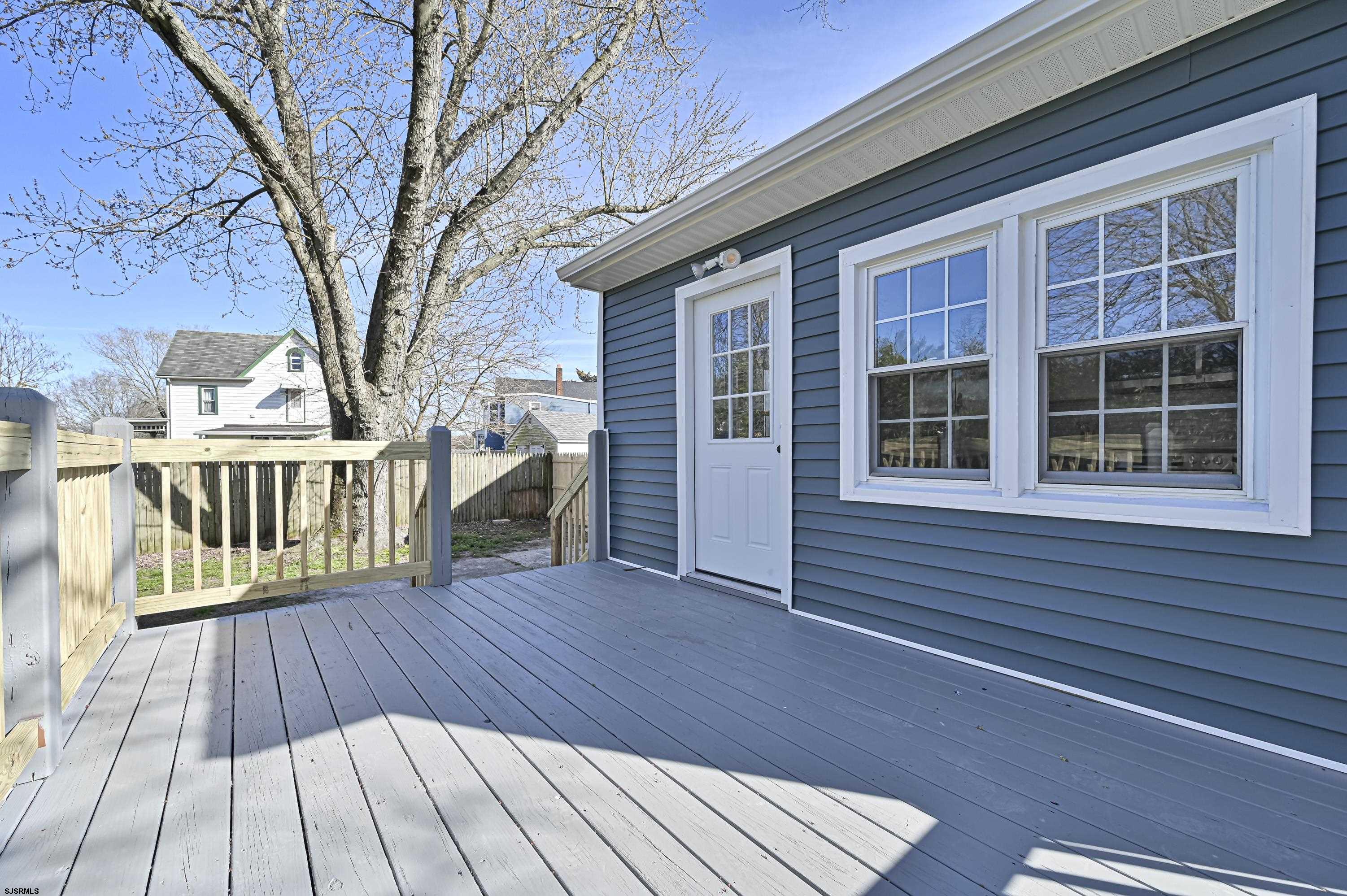 5906 Gaskill Street Mays Landing, NJ 08330 - Photo 36 of 39 a view of a house with wooden deck