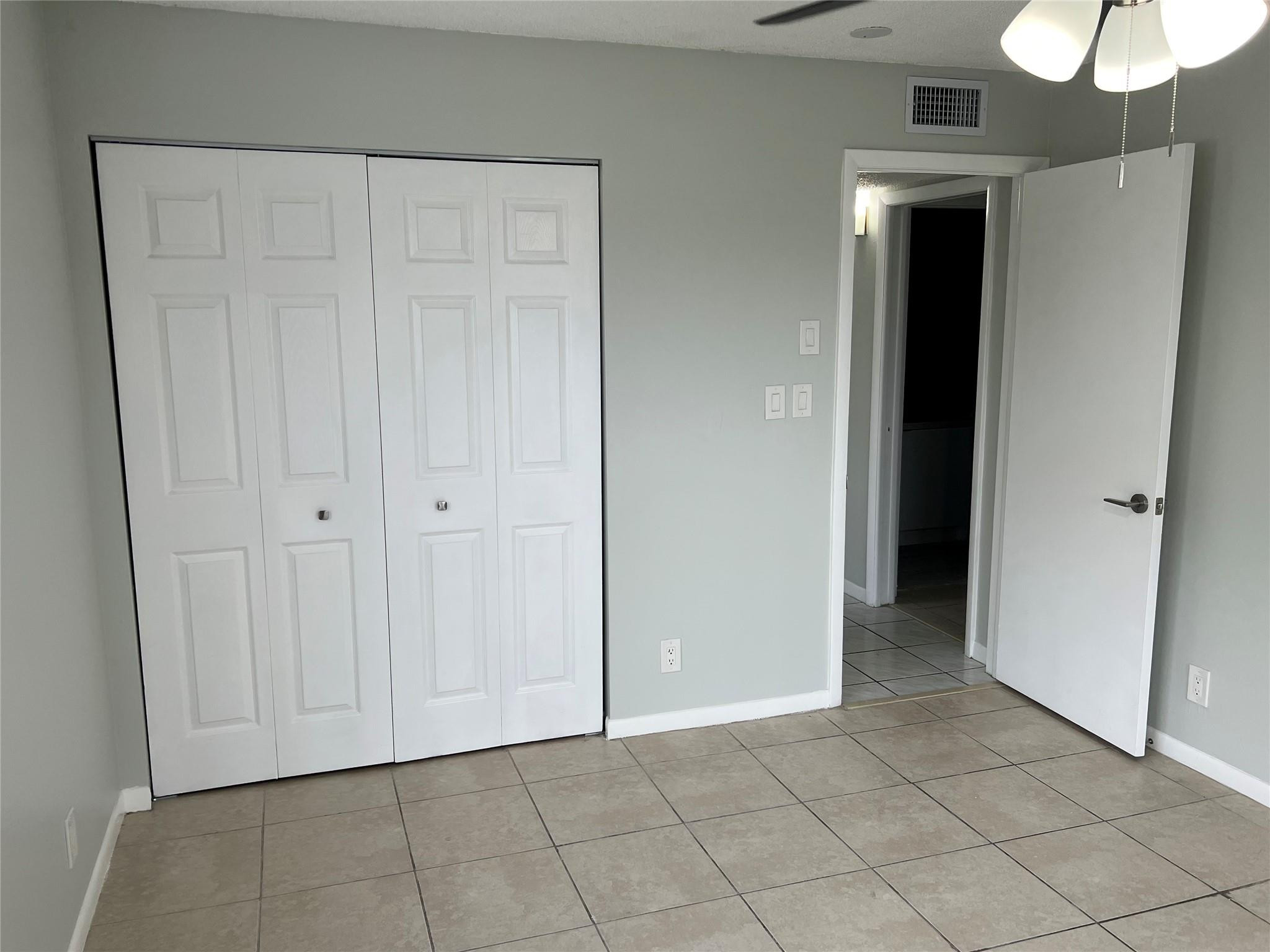 9920 Northwest 68th Place, Unit 210 Tamarac, FL 33321 - Photo 11 of 26 BEDROOM 1 CLOSET