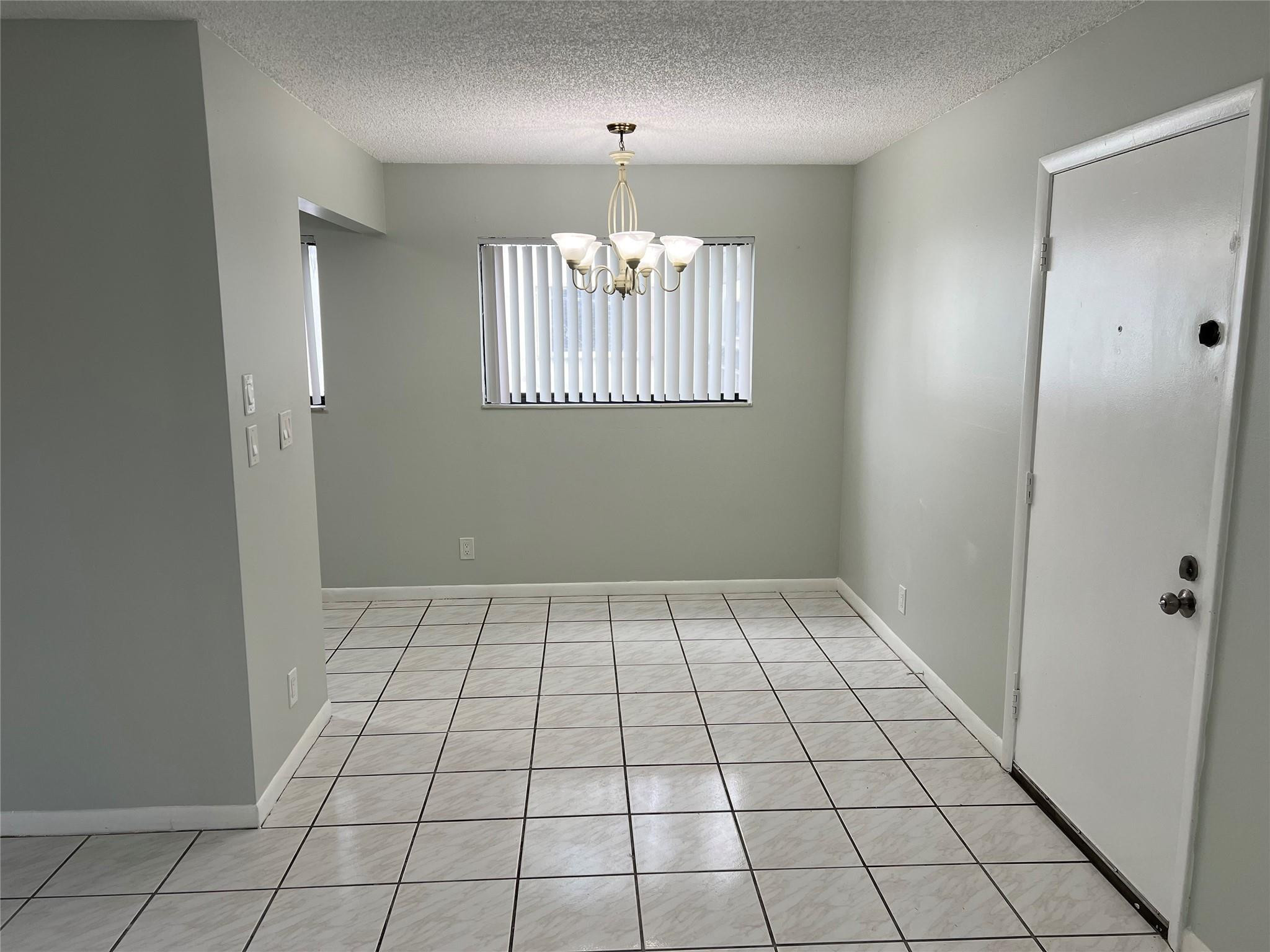 9920 Northwest 68th Place, Unit 210 Tamarac, FL 33321 - Photo 5 of 26 BREAKFAST/DINING ROOM