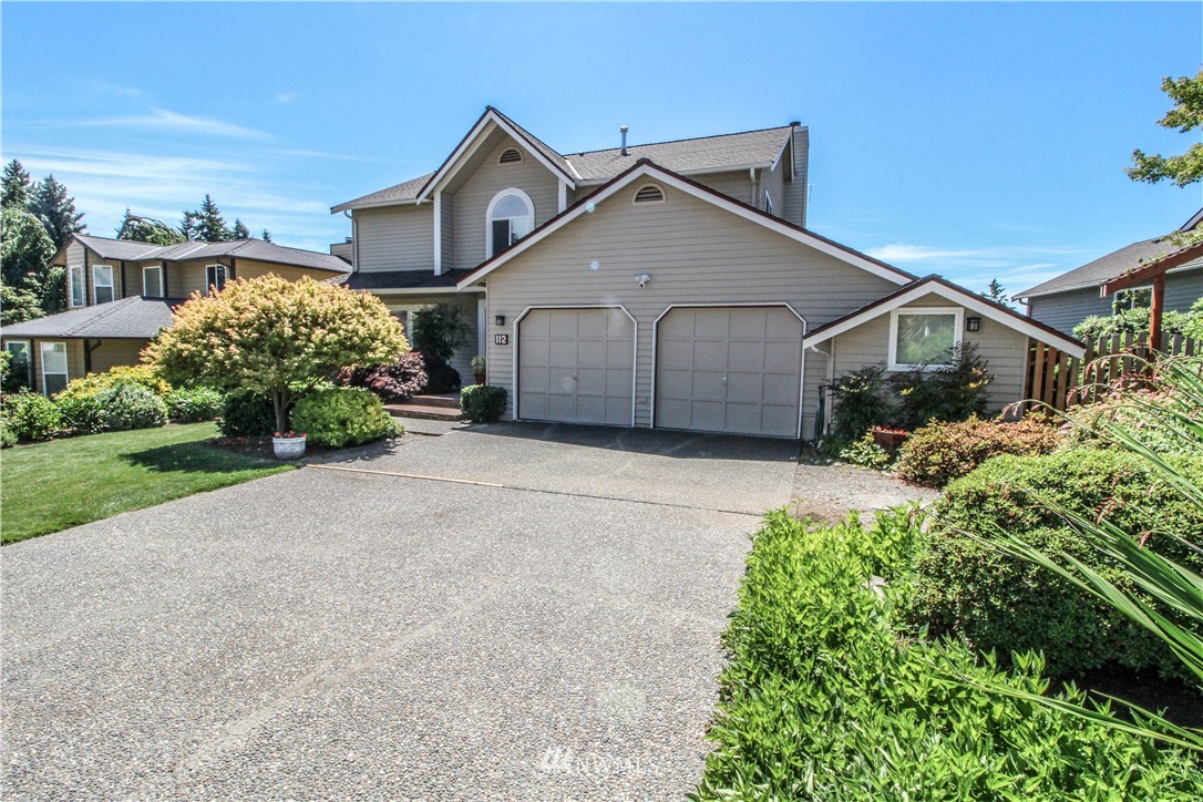 front view of a house with a street