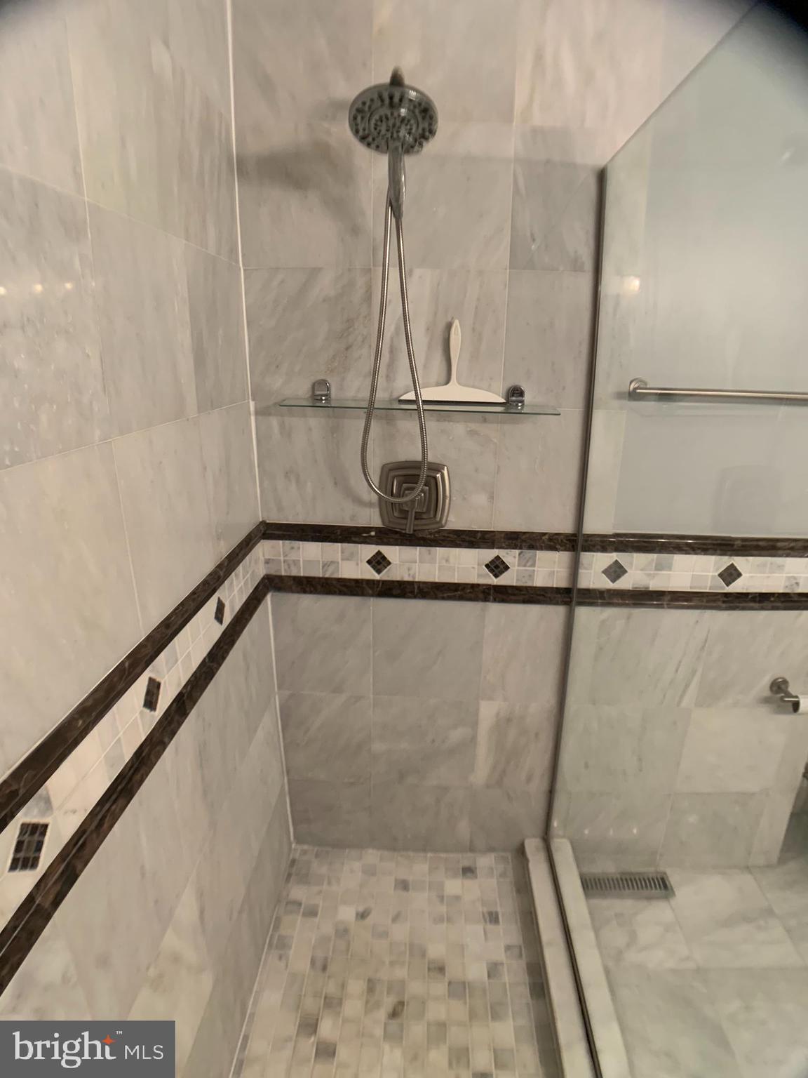 7925 Ridge Avenue, Unit 28 Philadelphia, PA 19128 - Photo 31 of 39 Primary Bedroom Ensuite Bathroom