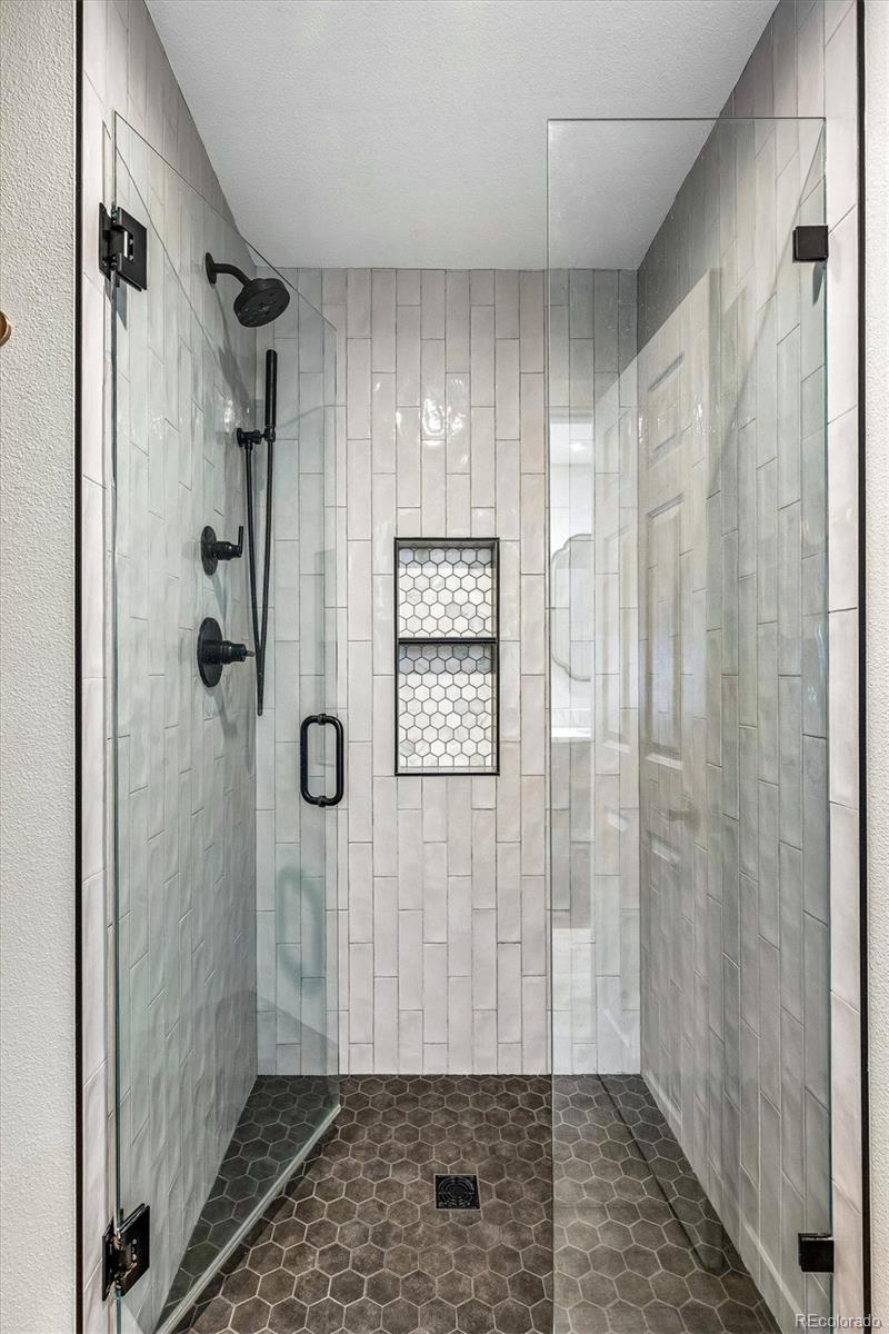 155 South Jackson Street, Unit A Denver, CO 80209 - Photo 19 of 40 a bathroom with a shower