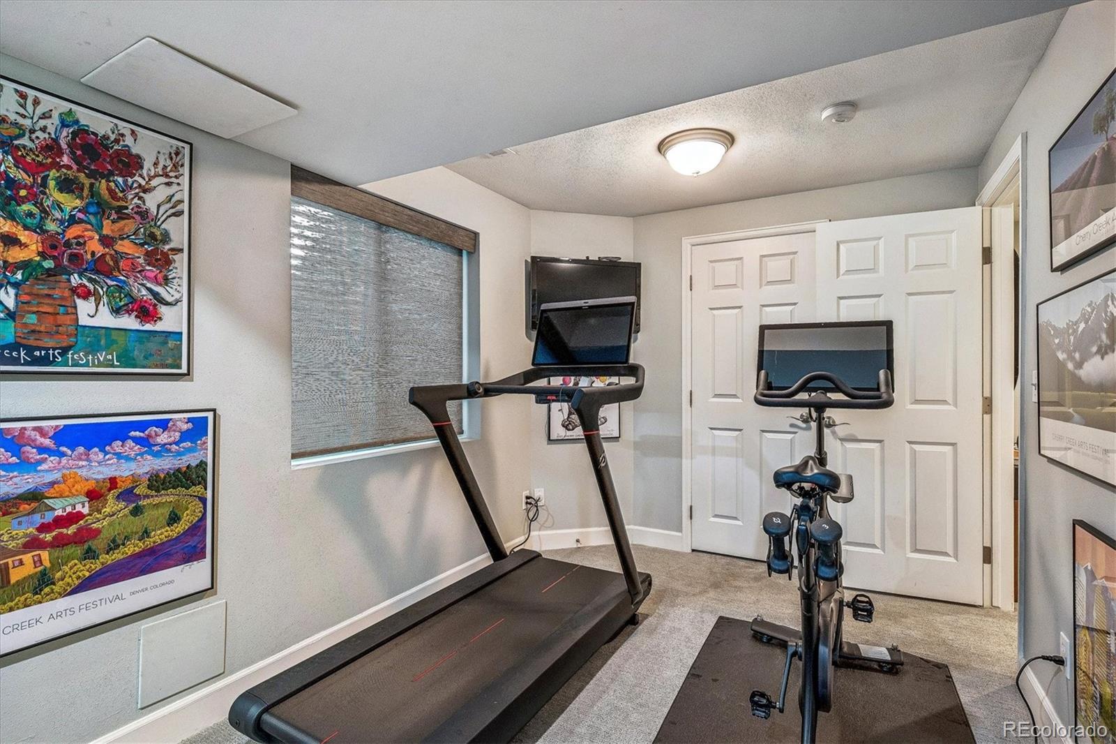 155 South Jackson Street, Unit A Denver, CO 80209 - Photo 25 of 40 a view of a room with gym equipment