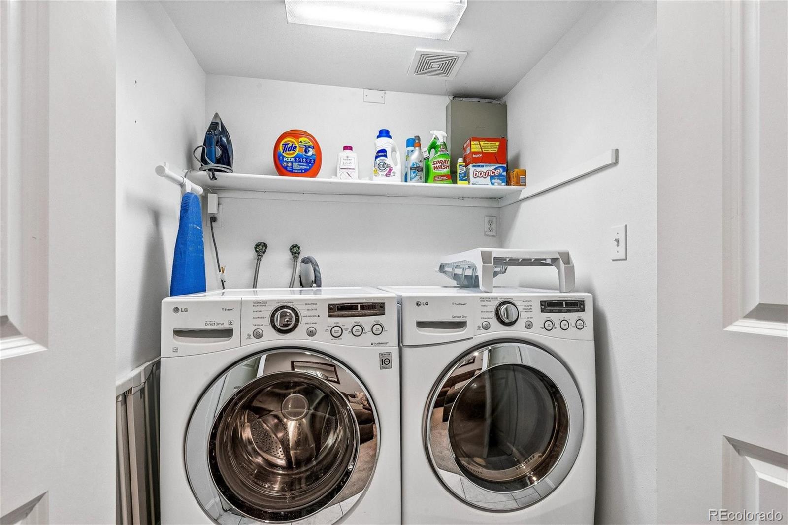 155 South Jackson Street, Unit A Denver, CO 80209 - Photo 28 of 40 a utility room with dryer and washer