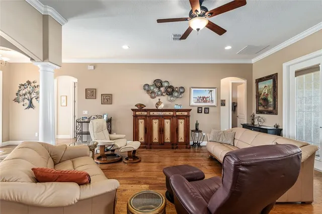 a bathroom with a granite countertop sink toilet a mirror a vanity and shower