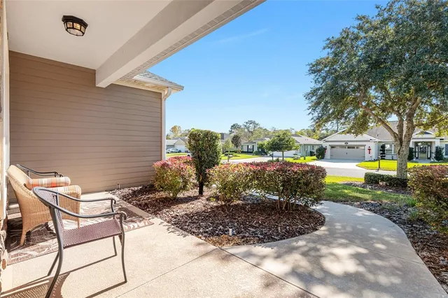 a kitchen with granite countertop a sink appliances and cabinets