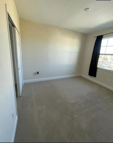 an empty room with a window