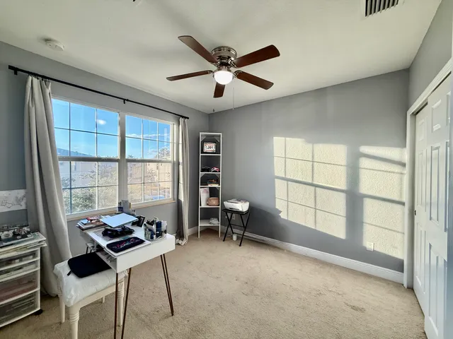 a view of small space with racks on the wall