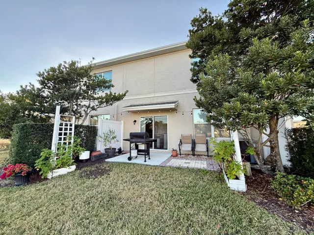 a view of a lake with outdoor seating