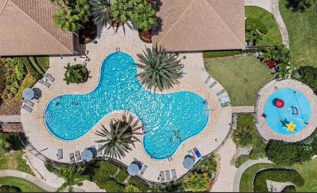 a view of swimming pool from a lake
