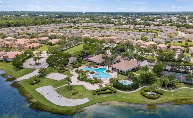 a view of an ocean with a building in the background