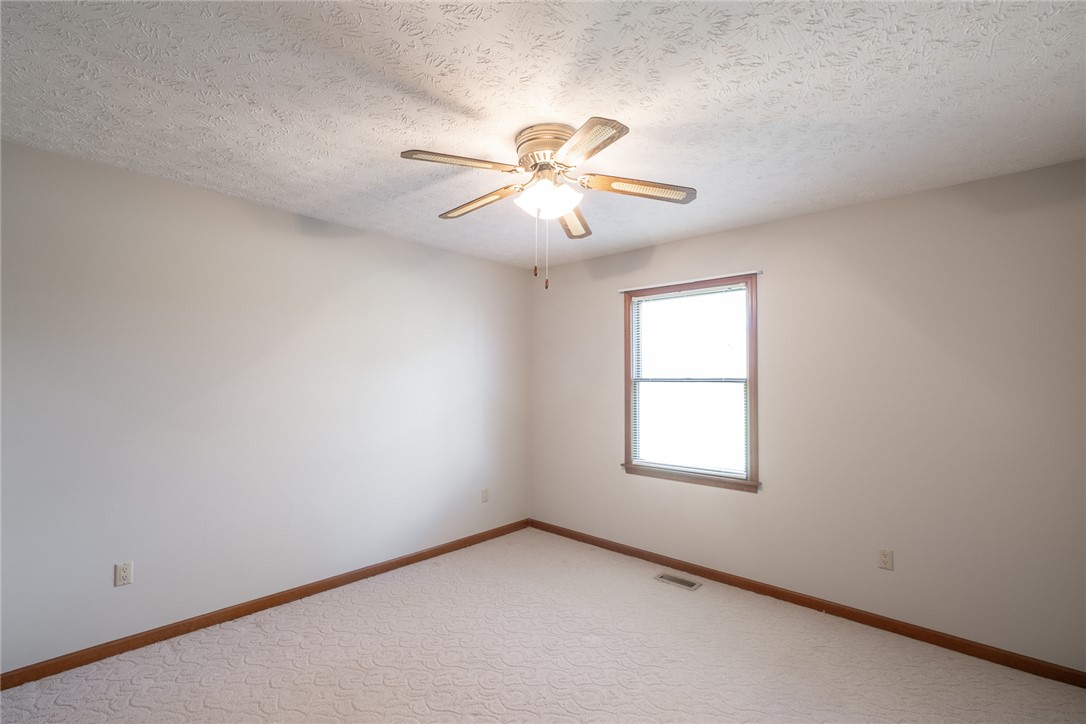 276 South Fairfield Road Bellbrook, OH 45305 - Photo 28 of 38 This bright and airy room offers a comfortable and inviting atmosphere for relaxation and rejuvenation.