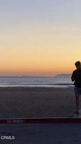 a view of fireplace and chair