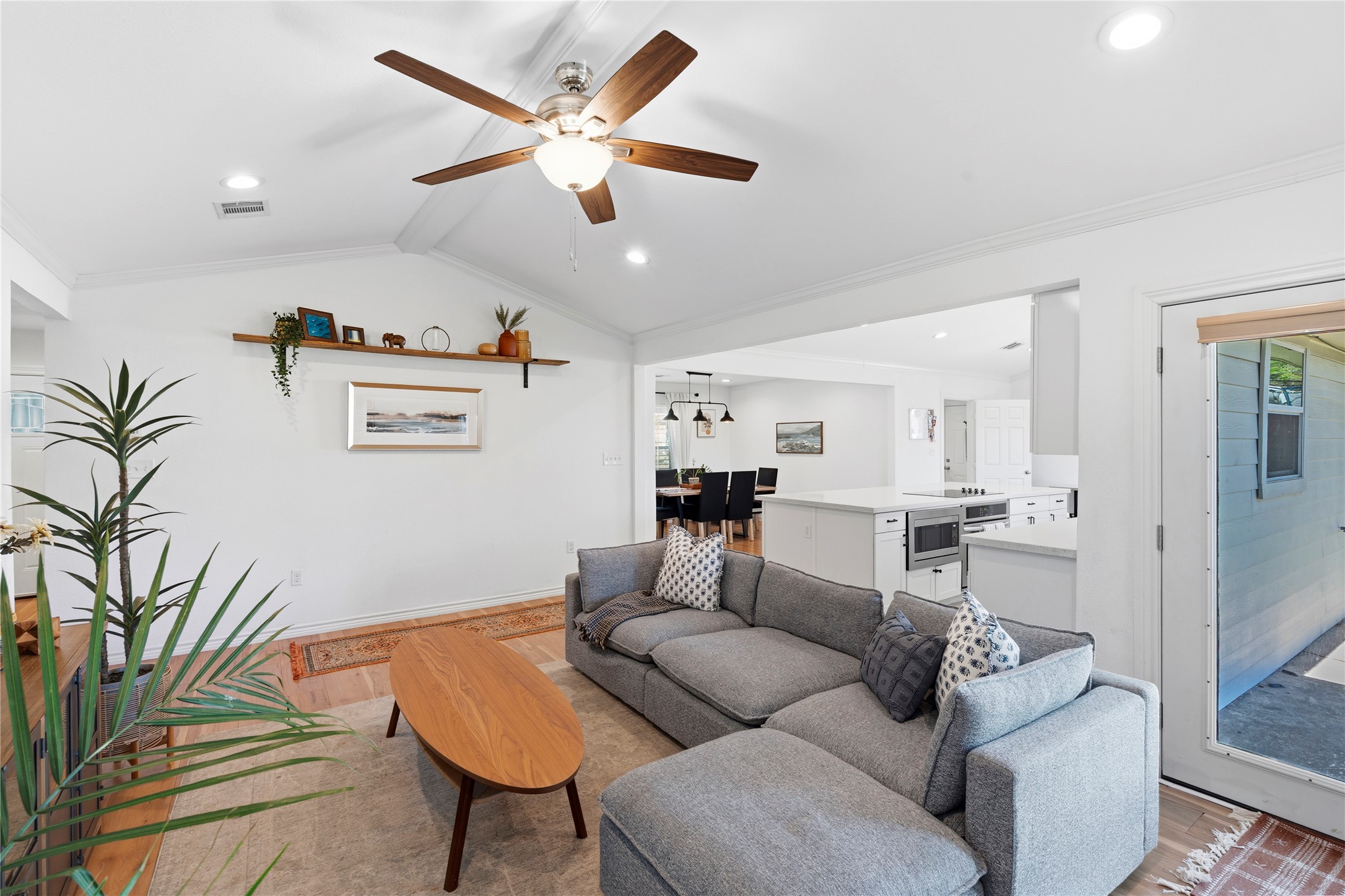 102 Enchanted Oaks Court Spring, TX 77388 - Photo 47 of 48 a living room with furniture and a chandelier