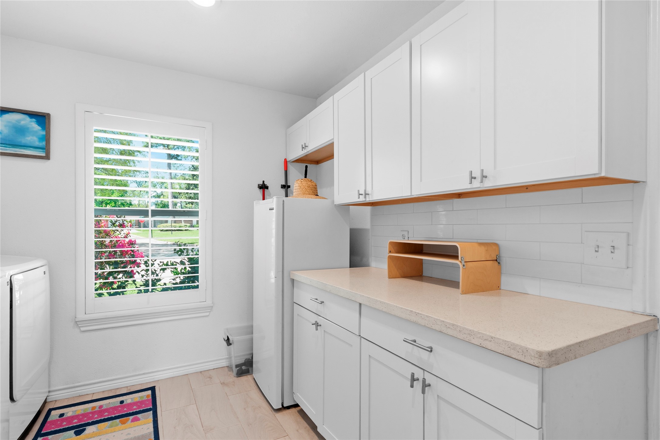 102 Enchanted Oaks Court Spring, TX 77388 - Photo 24 of 48 a kitchen with a sink cabinets and window