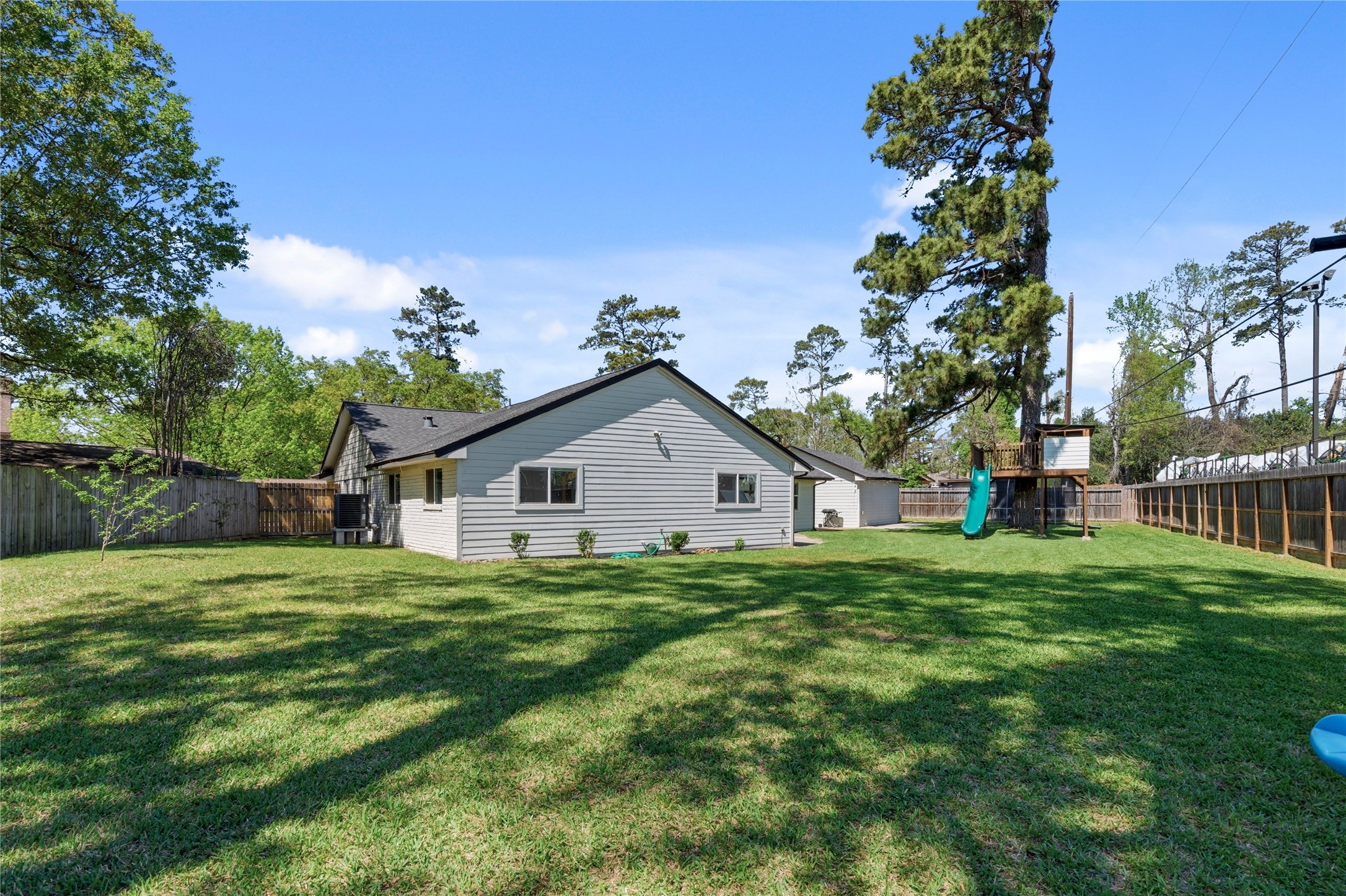 102 Enchanted Oaks Court Spring, TX 77388 - Photo 29 of 48 a house view with a garden space