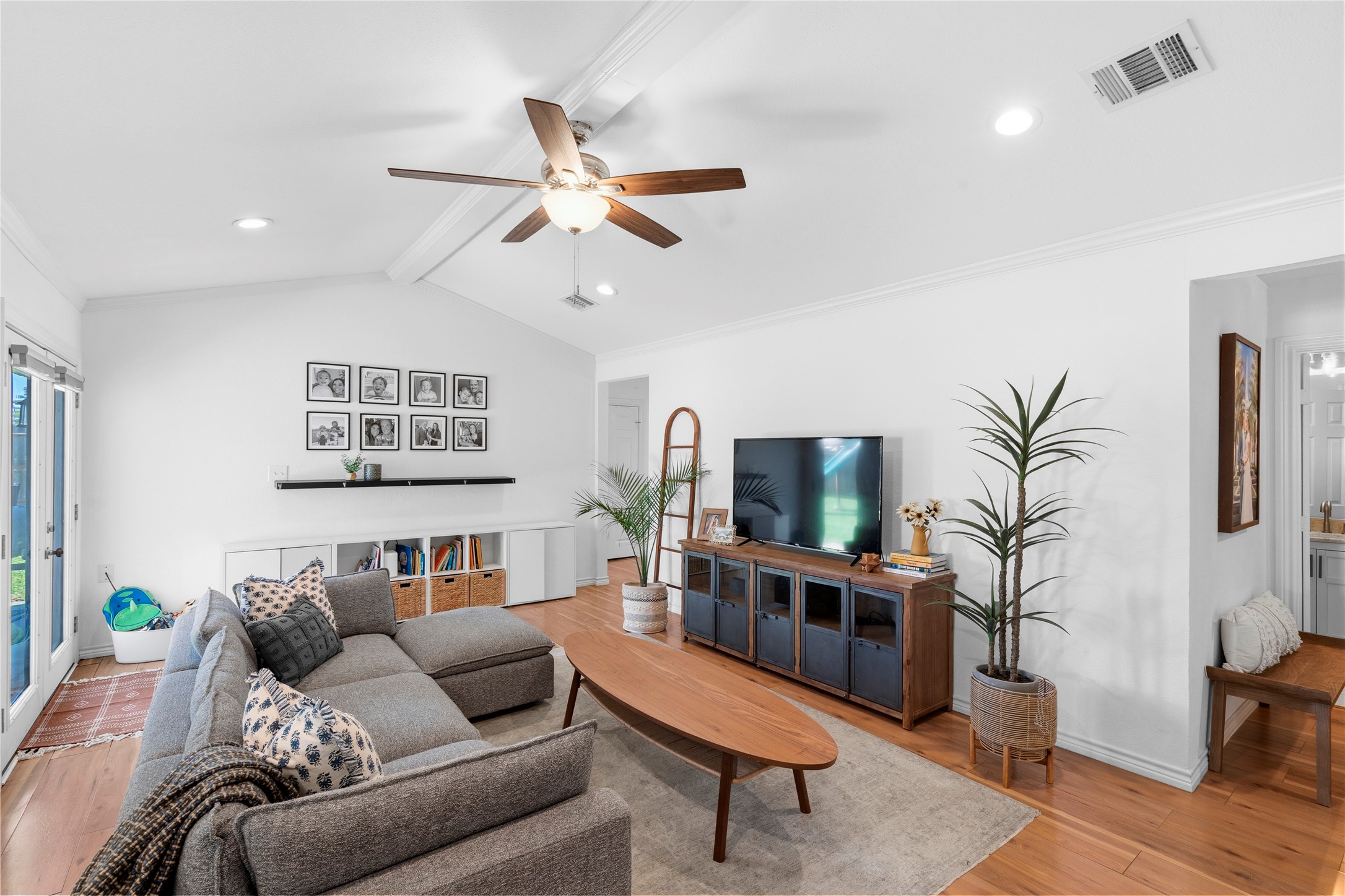 102 Enchanted Oaks Court Spring, TX 77388 - Photo 31 of 48 a living room with furniture and a flat screen tv