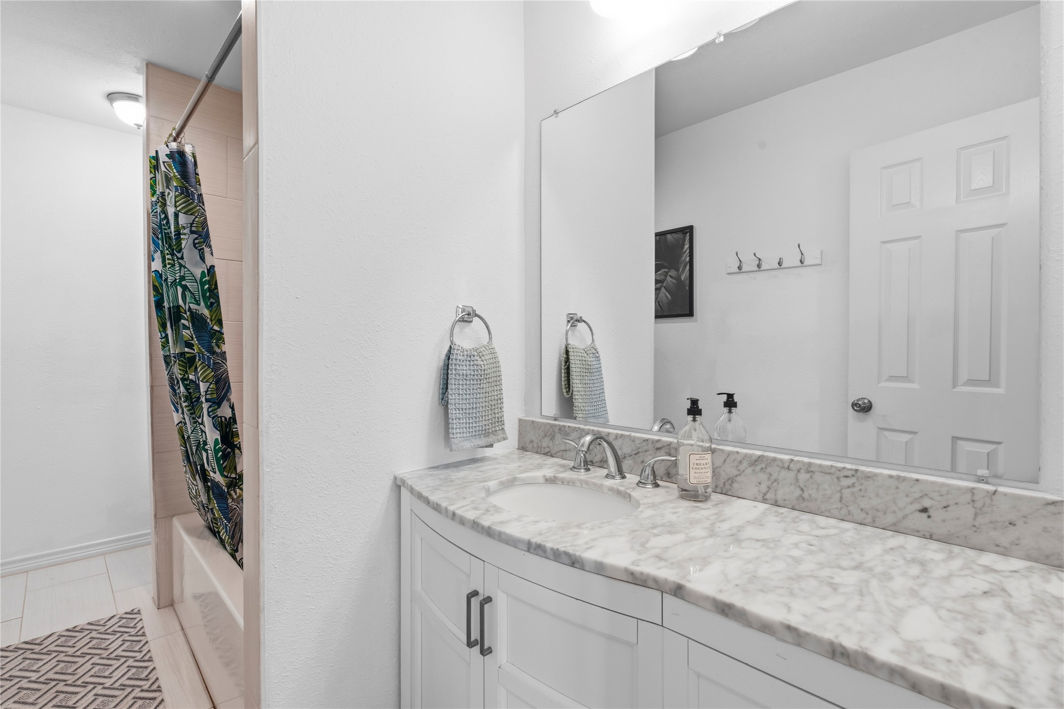 102 Enchanted Oaks Court Spring, TX 77388 - Photo 33 of 48 a bathroom with a granite countertop sink and a mirror
