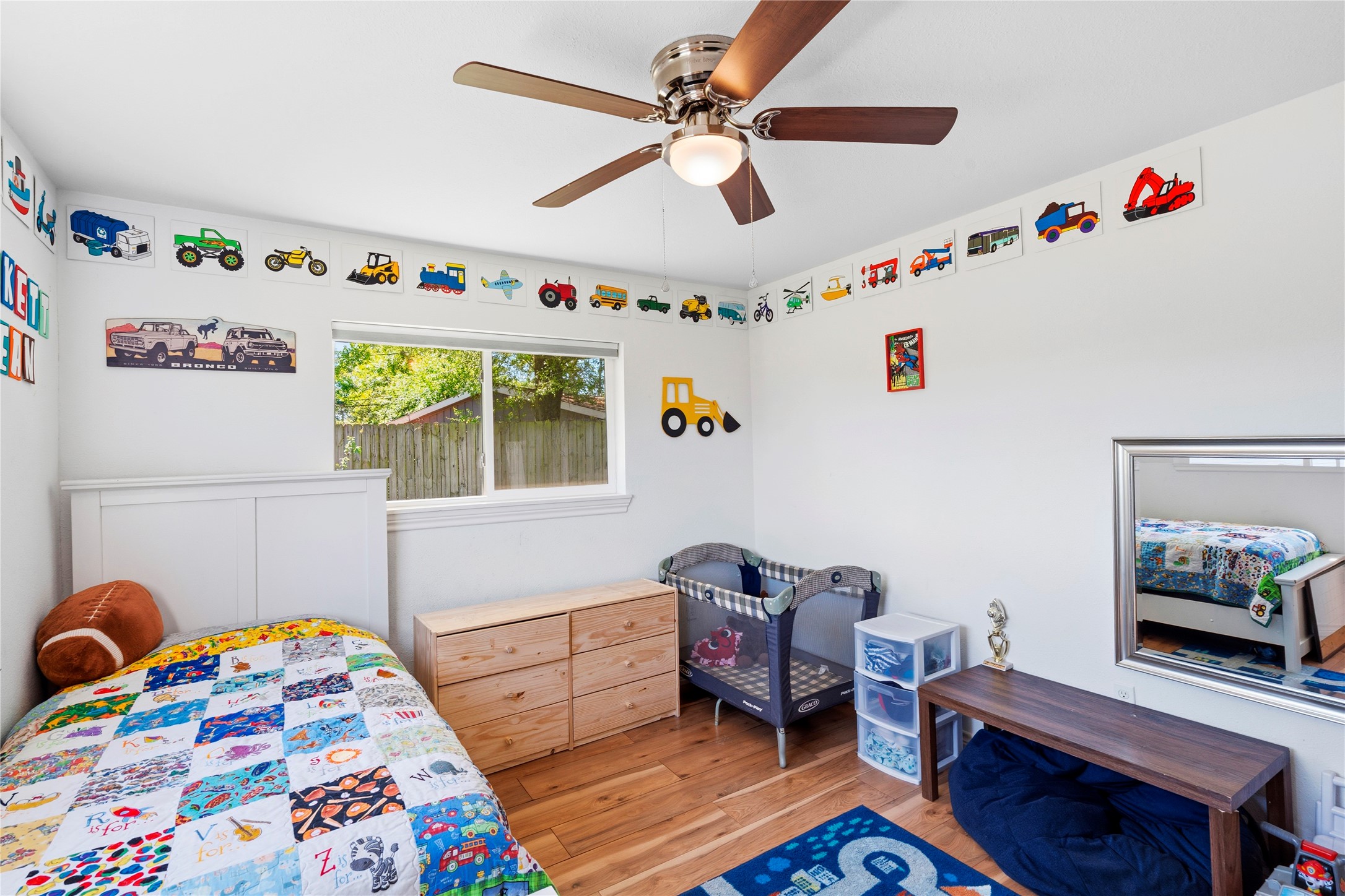 102 Enchanted Oaks Court Spring, TX 77388 - Photo 34 of 48 a bedroom with furniture and a window