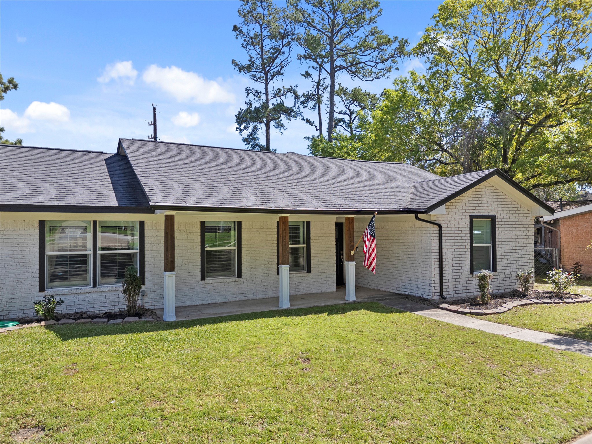 102 Enchanted Oaks Court Spring, TX 77388 - Photo 37 of 48 a house view with a garden space