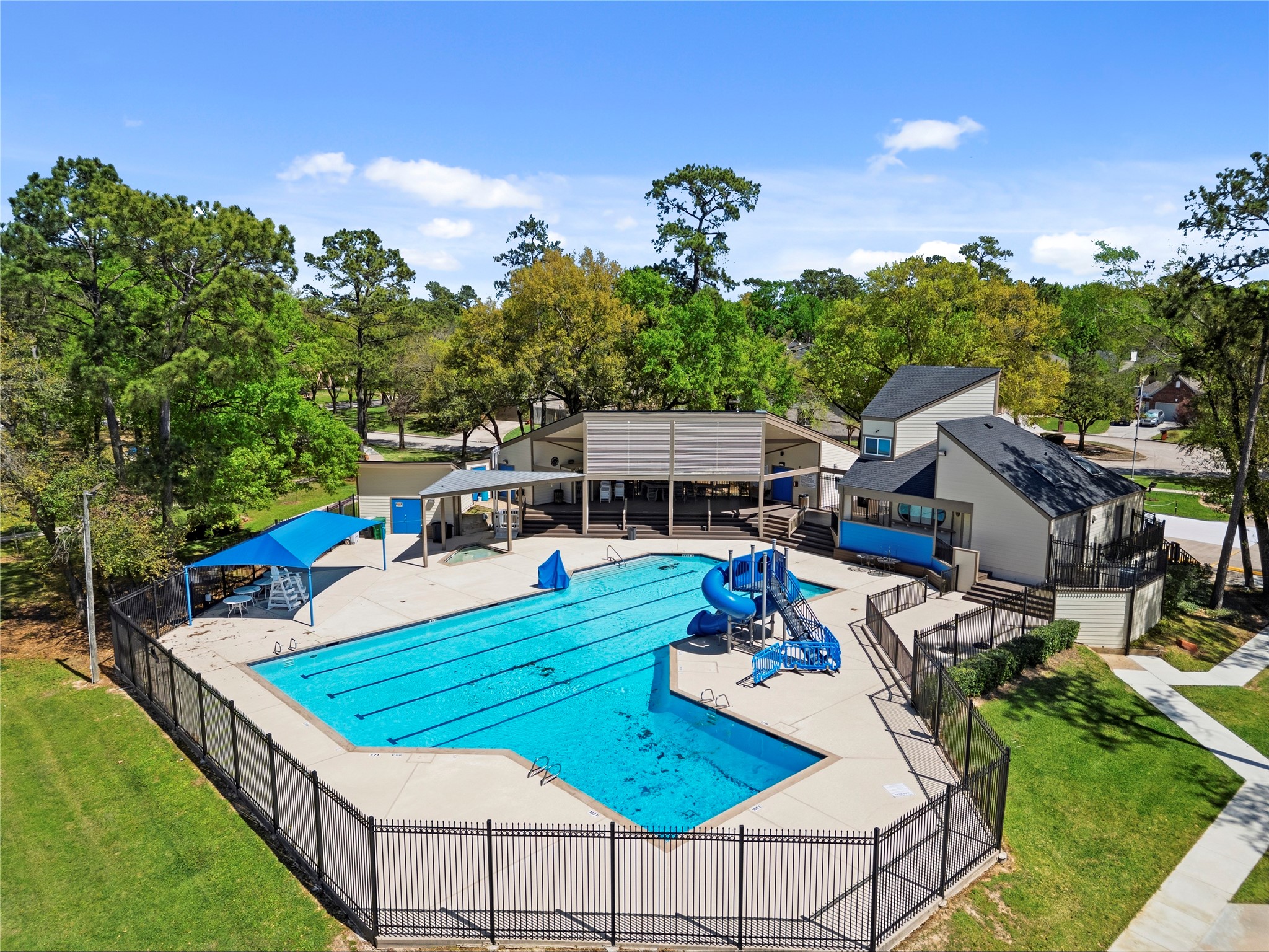 102 Enchanted Oaks Court Spring, TX 77388 - Photo 39 of 48 a view of a house with backyard porch and sitting area
