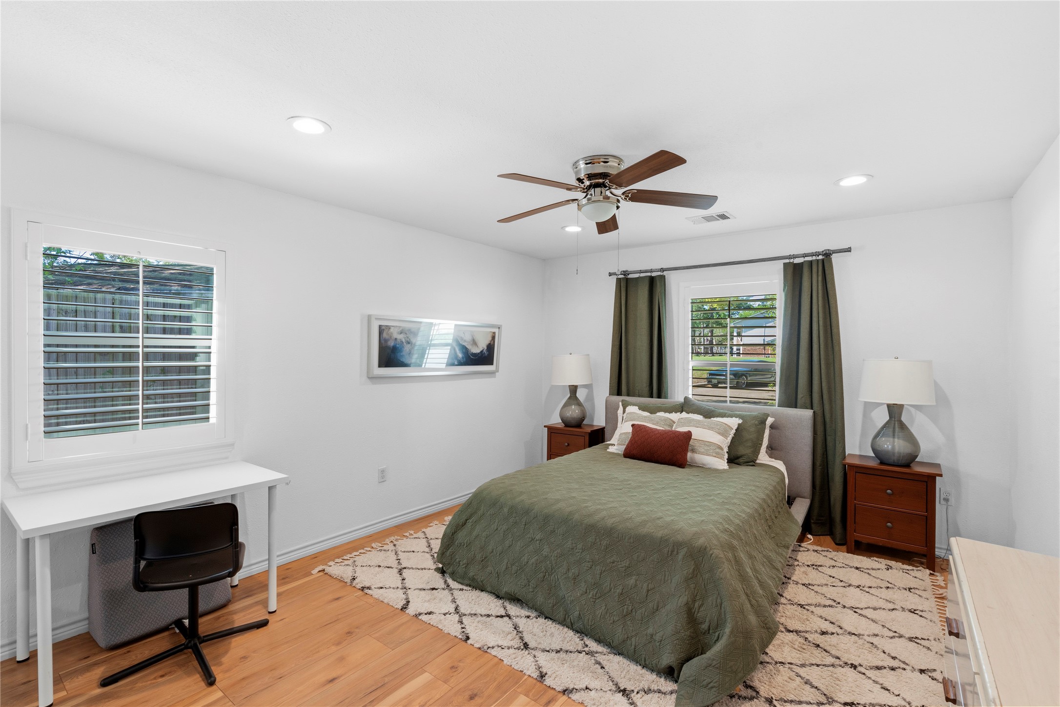 102 Enchanted Oaks Court Spring, TX 77388 - Photo 8 of 48 a bedroom with a large bed and a window