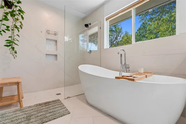 a view of a bathtub in a bathroom