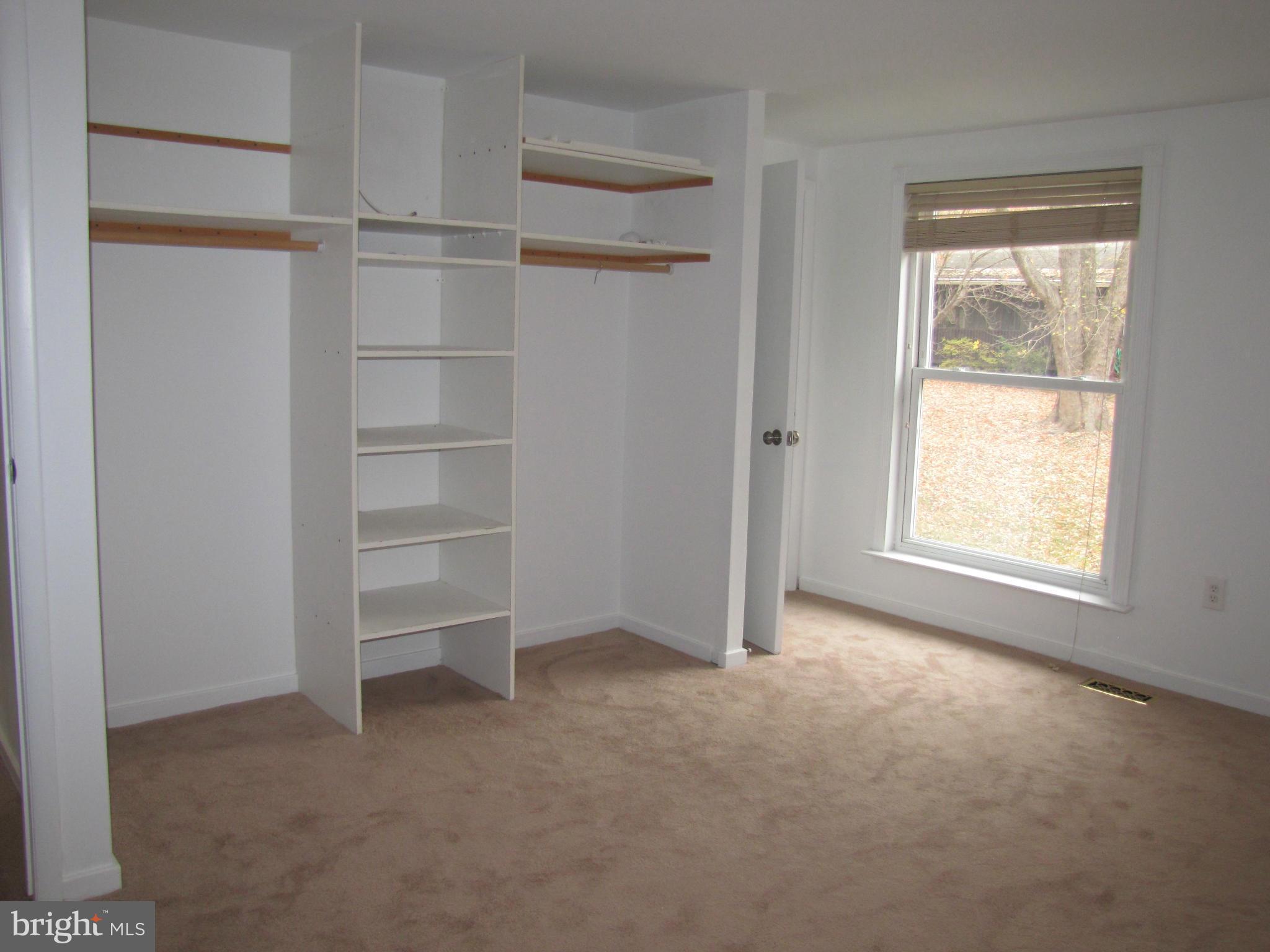 6348 Sandchain Road Columbia, MD 21045 - Photo 14 of 24 a view of an empty room with a window
