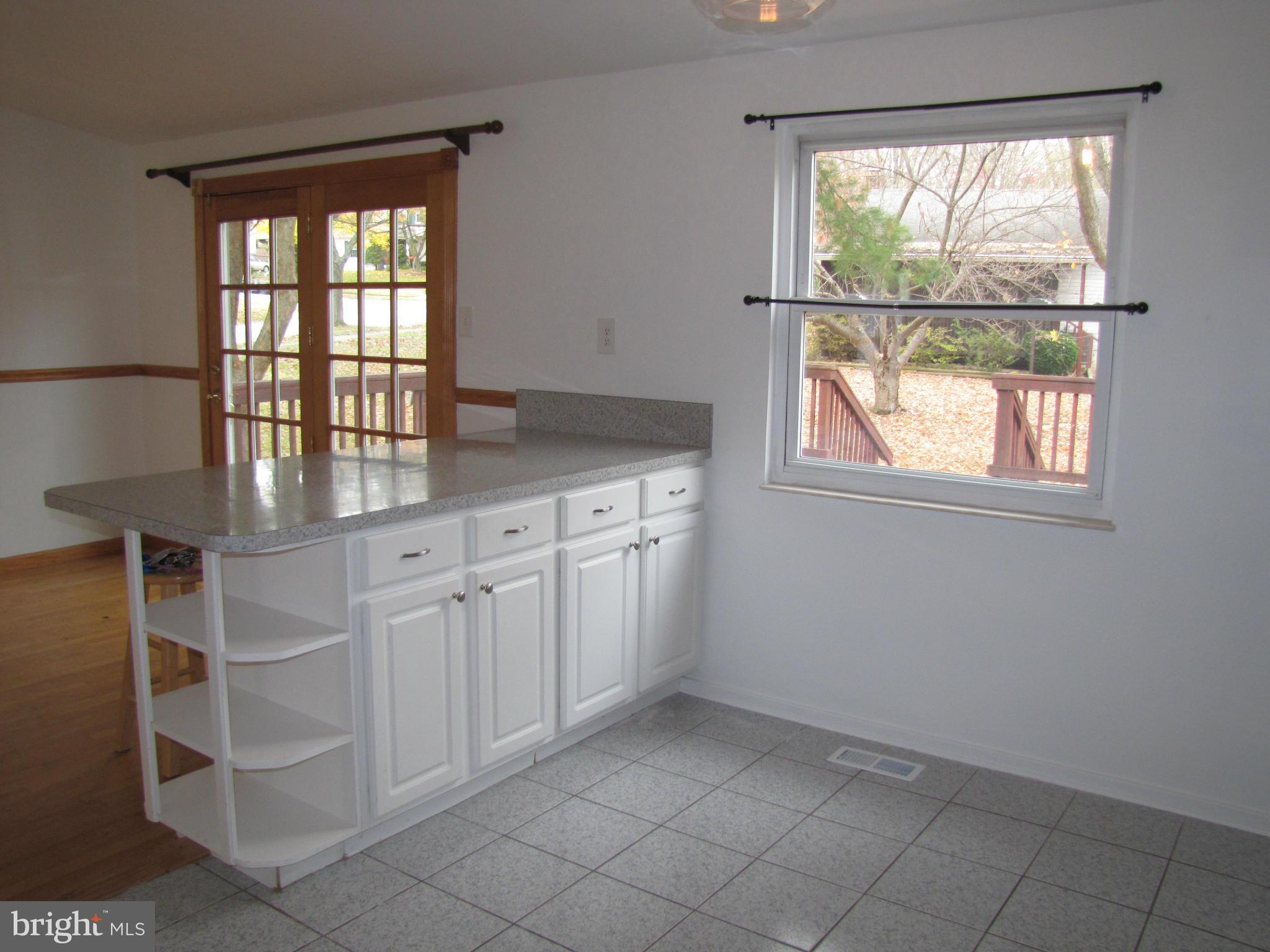 6348 Sandchain Road Columbia, MD 21045 - Photo 8 of 24 an empty room with windows