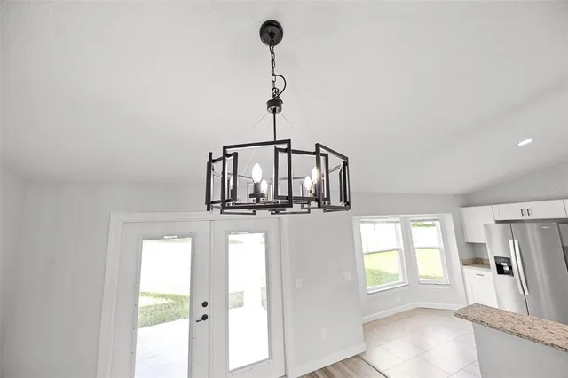 a view of garage and yard