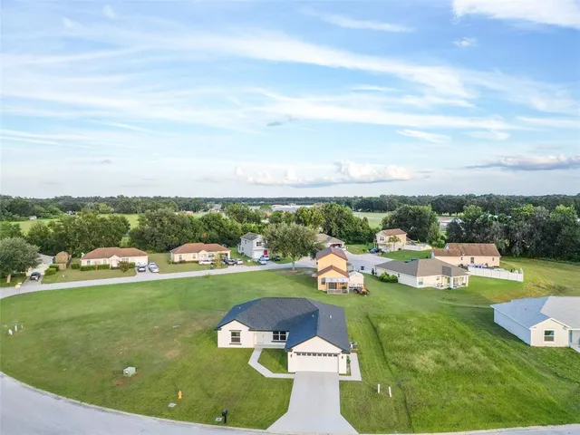 a house view with a garden space