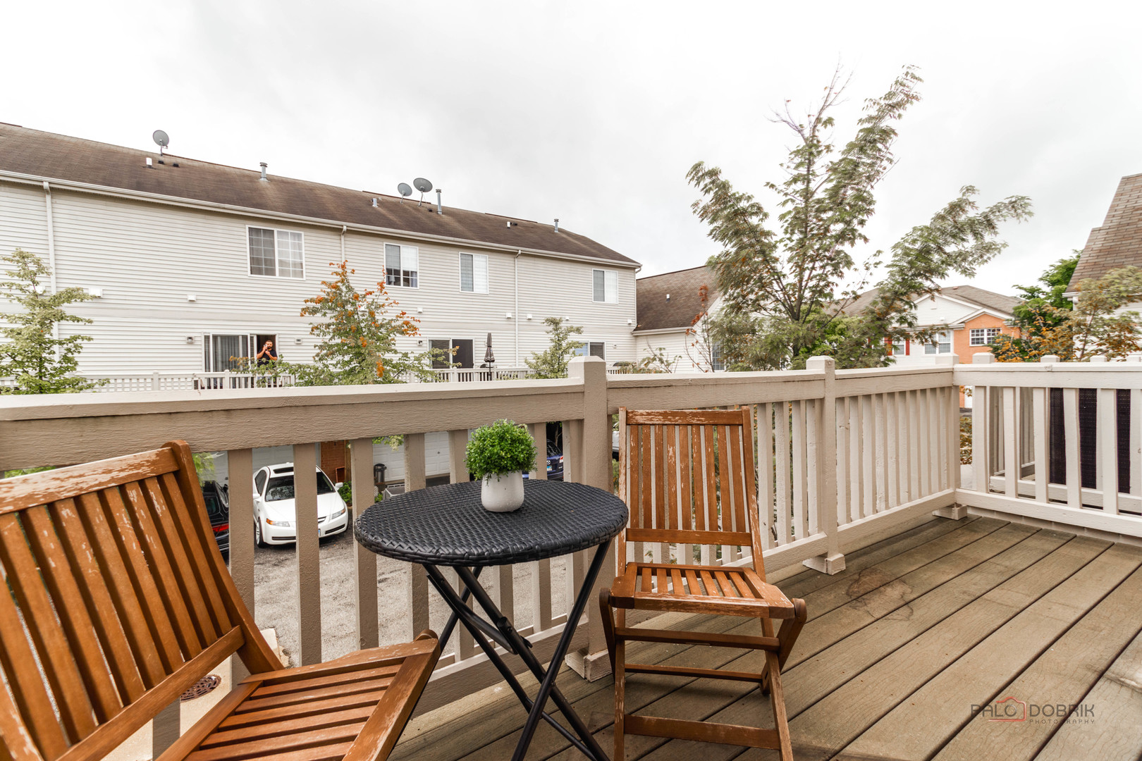 7515e Savoy Lane, Unit C Bridgeview, IL 60455 - Photo 11 of 22 a view of a roof deck with wooden floor and fence
