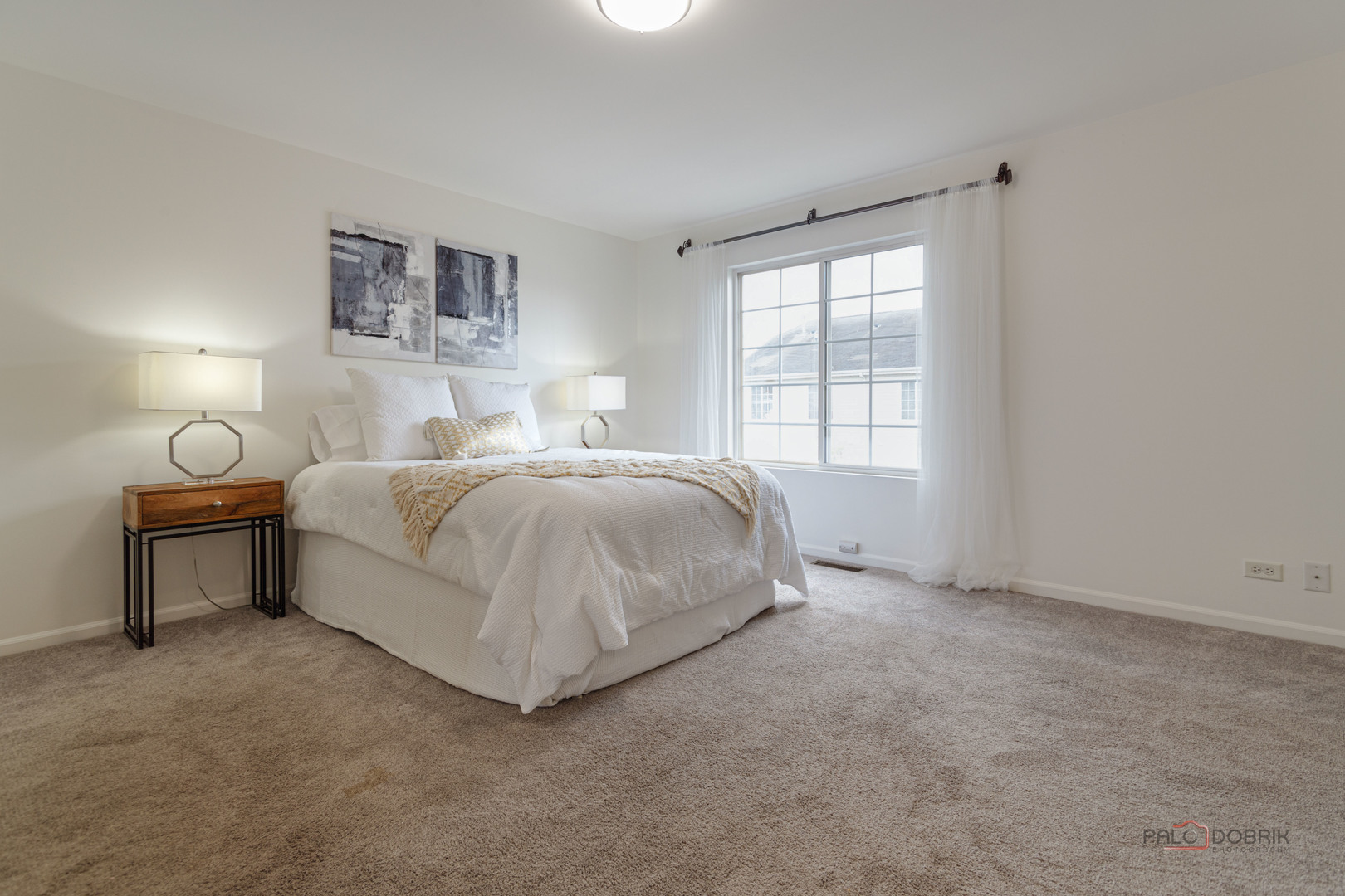 7515e Savoy Lane, Unit C Bridgeview, IL 60455 - Photo 14 of 22 a bedroom with a bed and a window