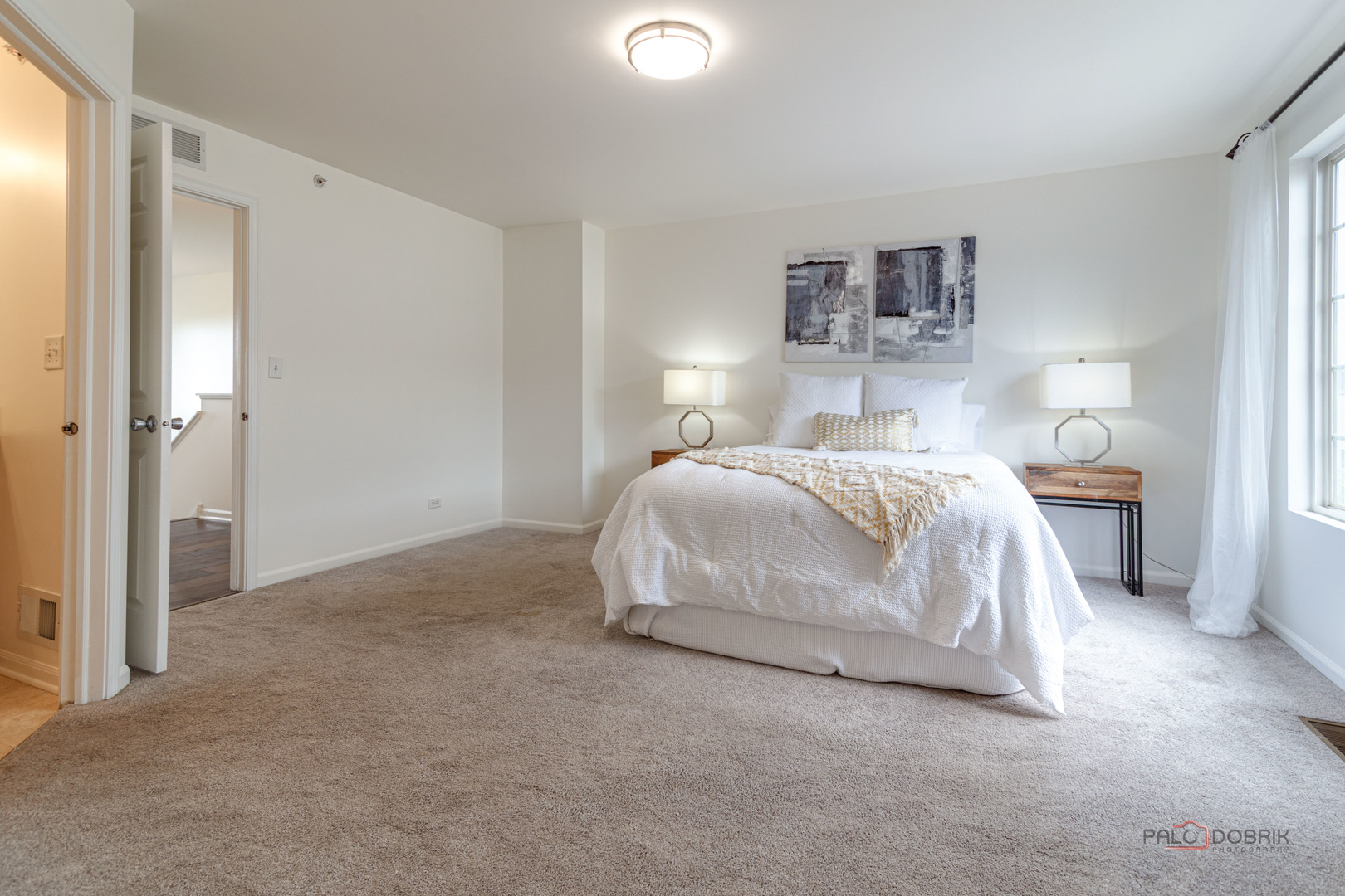 7515e Savoy Lane, Unit C Bridgeview, IL 60455 - Photo 15 of 22 a bedroom with a bed and a lamp