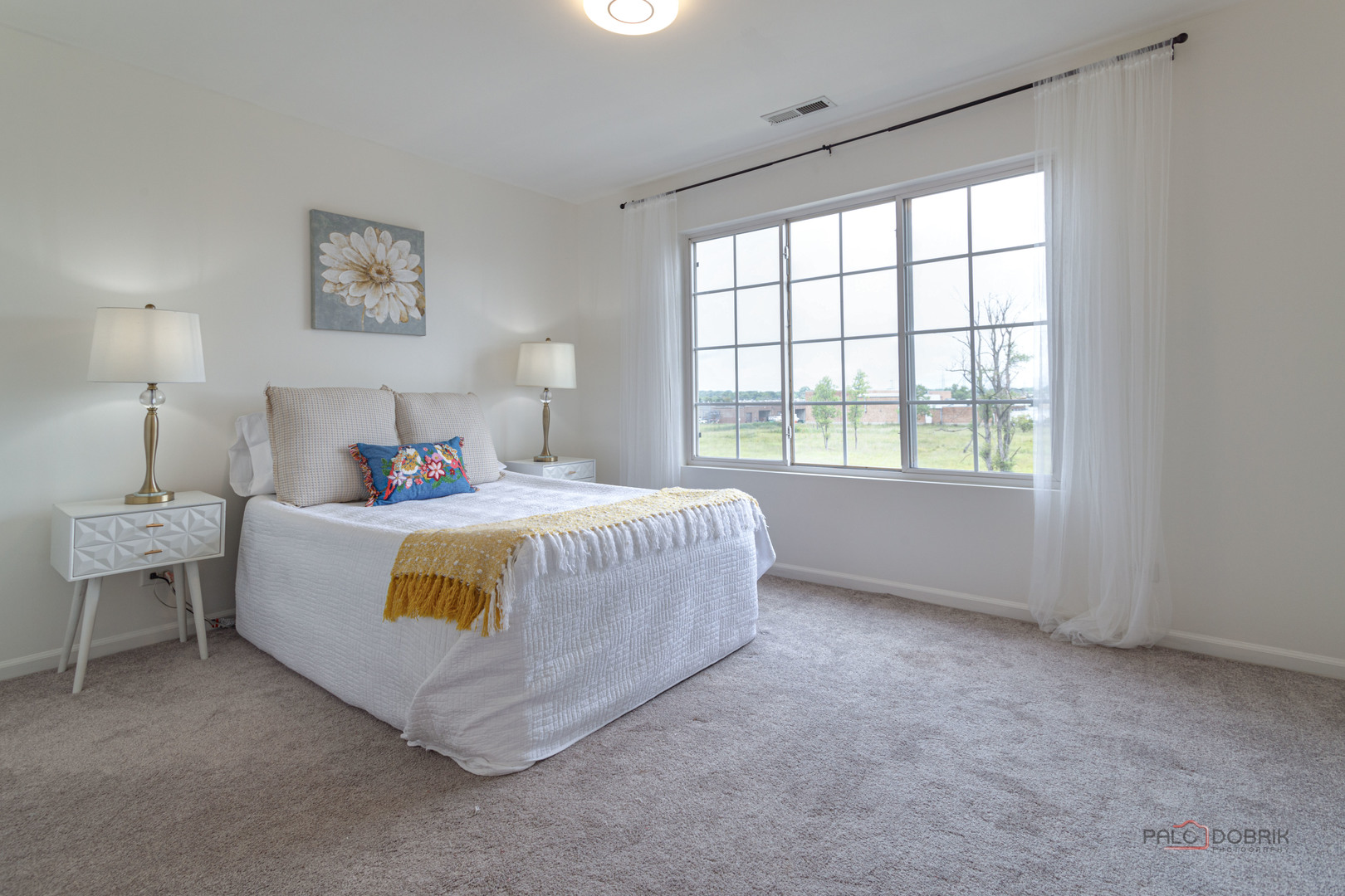 7515e Savoy Lane, Unit C Bridgeview, IL 60455 - Photo 17 of 22 a bed sitting in a bedroom next to a window