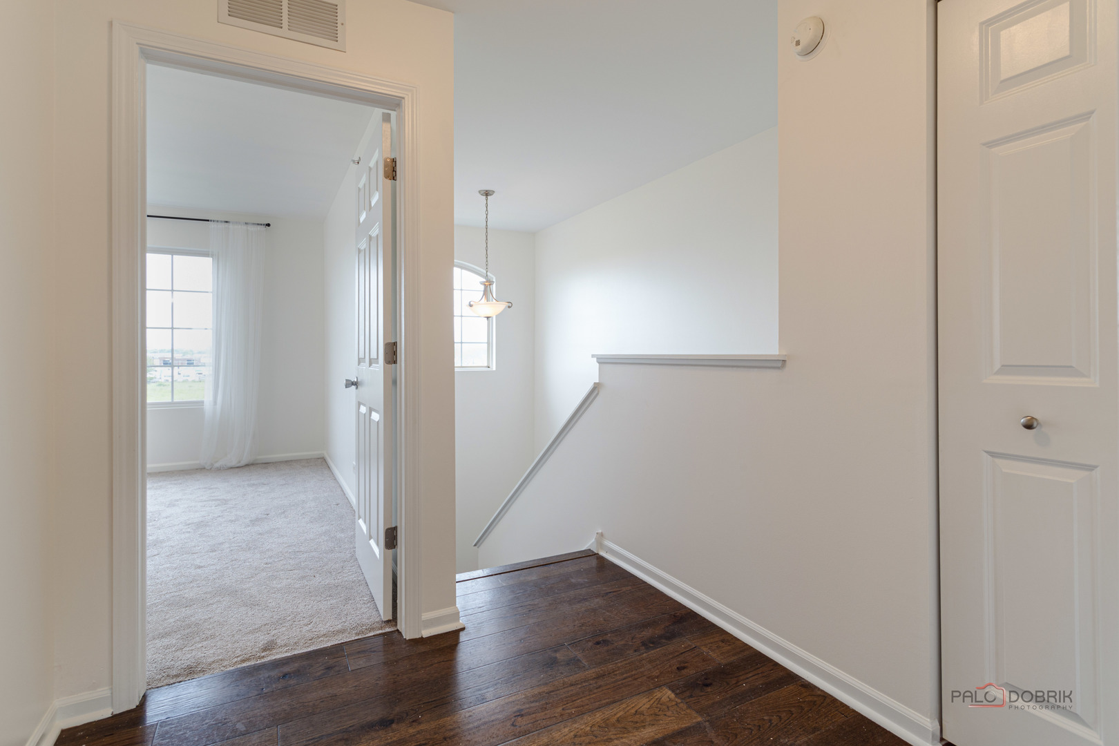 7515e Savoy Lane, Unit C Bridgeview, IL 60455 - Photo 20 of 22 a view of a hallway with wooden floor