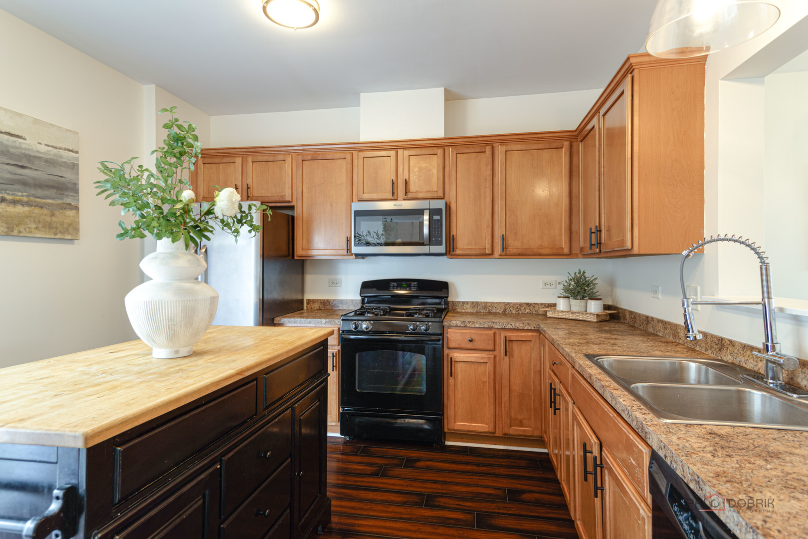 7515e Savoy Lane, Unit C Bridgeview, IL 60455 - Photo 10 of 22 a kitchen with a sink stove and microwave