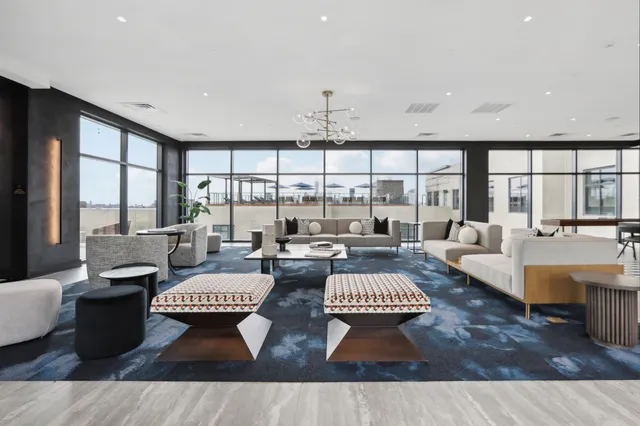 a large room with lots of table and chairs